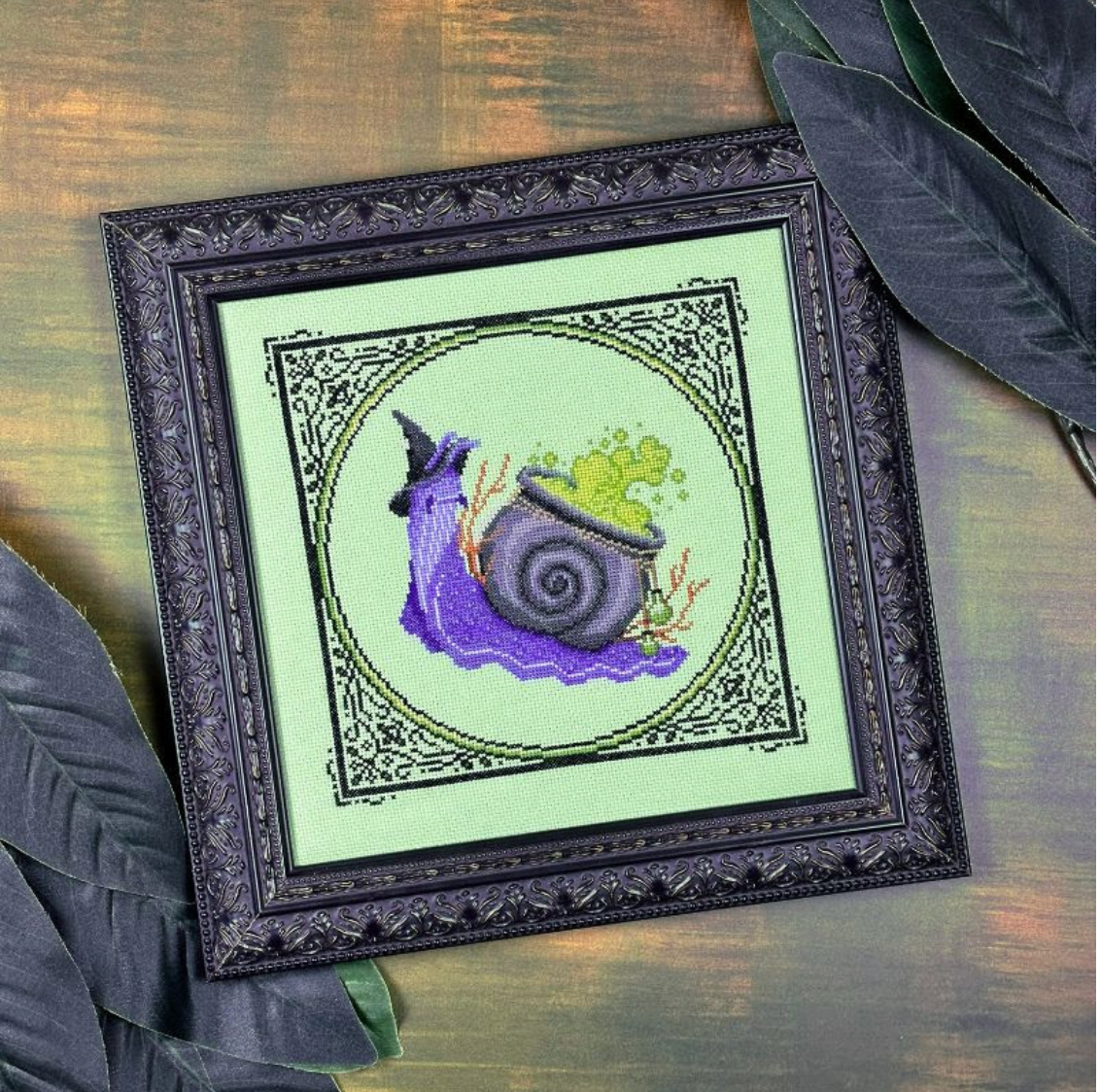 *PREORDER* Cauldron Snail ~ The Stitch Crypt ~ Nashville Needlework Market 2026